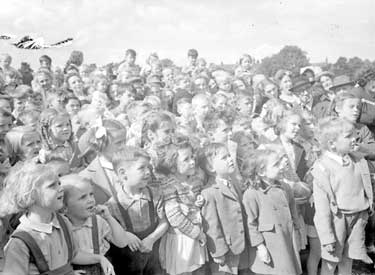 Children watching Puppet Show in Greenhead Park 	