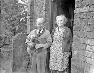 Couple with dog 	