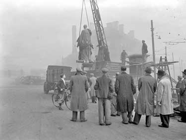 Statue of Sir Robert Peel being removed from St George's Square, Huddersfield 	