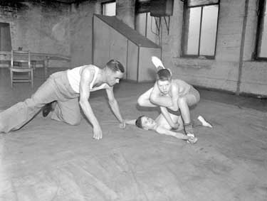 Blackburn and Dyson, young wrestlers at Cambridge Road Baths 	
