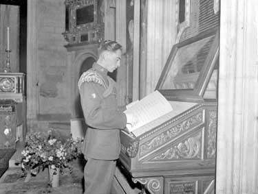 Memorial Service for D.W.R. War Dead at York Minster, Drummer Henrys with the Book of Honour 	