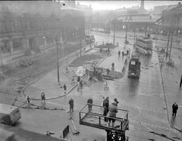 Road repairs in St George's Square, Huddersfield 	