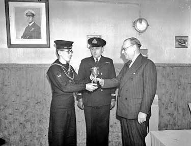 Huddersfield Sea Cadet receiving trophy 	