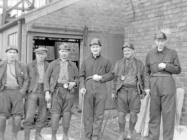 Lord Saville and Canon Woods with Miners at Emley Pit 	