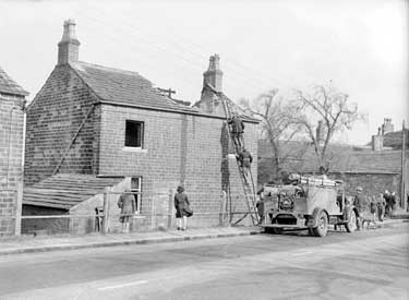 Fire-destroyed house, Penistone Road, with Firemen 	