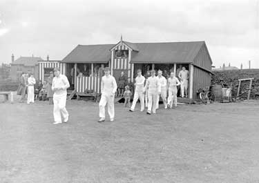 Almondbury Cricket Team coming out 	
