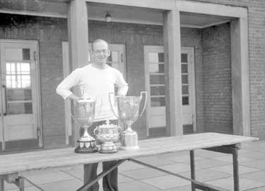 Harry Whittle with Trophies 	