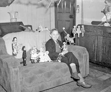 Malcolm Haigh of Shepley with puppets 	