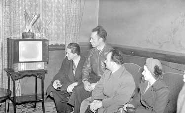 Group watching television 	