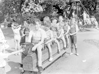 Children playing in Greenhead Park, Huddersfield 	