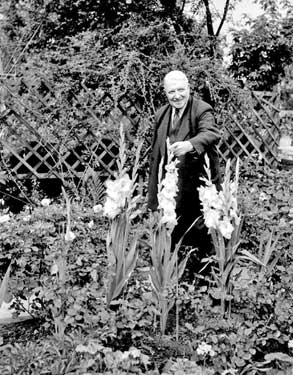 Man in garden, Lindley, Huddersfield 	