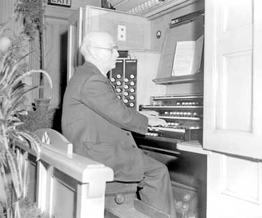 Ernest Cooper at Town Hall organ 	