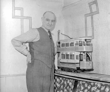 Mr Jones with model tram at Milnsbridge, Huddersfield 	