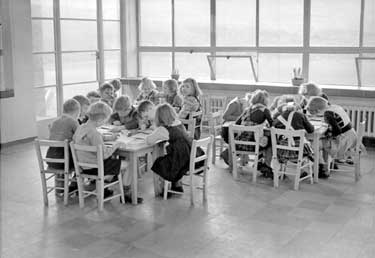 Elland school children sat at desks 	
