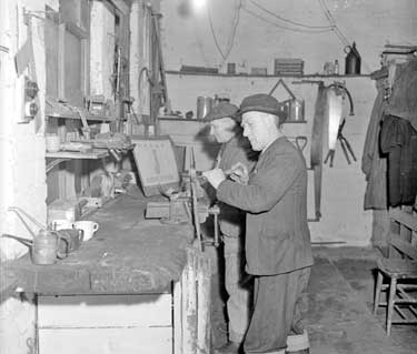 Groundsmen, C.Cusworth and V. Clough in Workshop 	