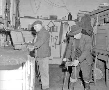 Groundsmen, C. Cusworth and V.Clough in Workshop 	