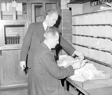 Sorting dead letters at Post Office 	