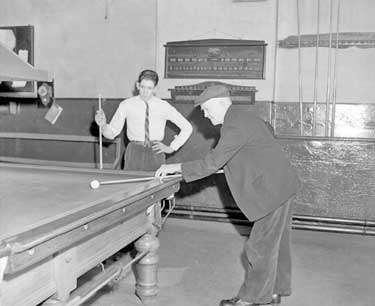 Men playing snooker at Public House in Emley, Huddersfield 	