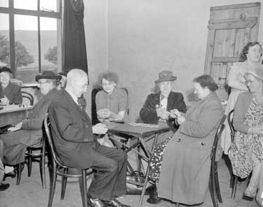 Group playing cards at Outlane, Huddersfield 	