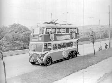 Trolley bus decorated for the Coronation 	