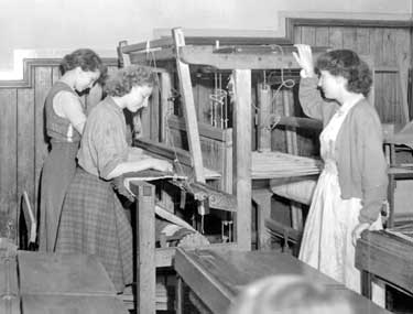 Women weaving 	