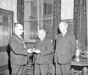 Presentation to Frank North at Town Hall 	
