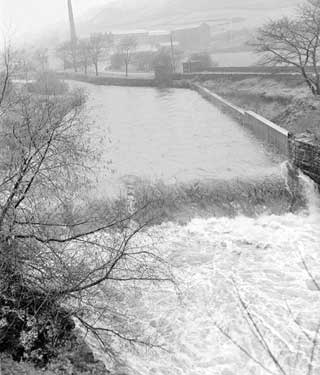 Swollen River Colne at Linthwaite, Huddersfield 	