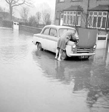 Car stuck in flood at Kirkburton, Huddersfield 	