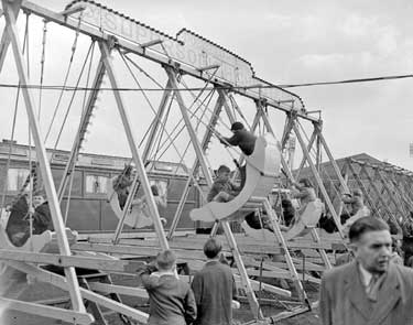 Swings at Leeds Road fairground 	