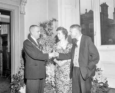 Mayor and Mayoress with Donald Wade. 	