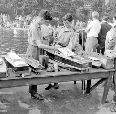 Open Day at Ravensknowle Park, Dalton, Huddersfield - boys with model boats.	