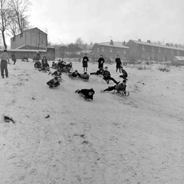 Children playing in snow 	