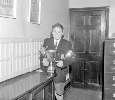 Michael Powner with trophies 	