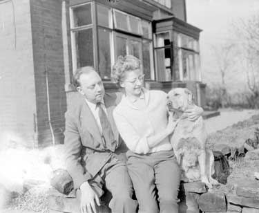 Mr and Mrs J Tempest with their dog, Sandra 	