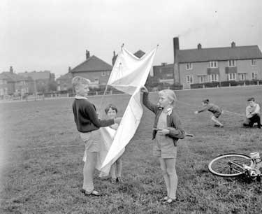 Henderson-Smith children with their kite 	
