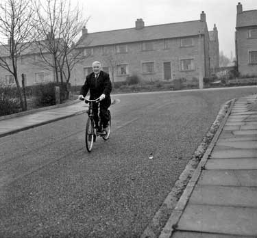 James Wilkinson aged 78 cycling at Golcar, Huddersfield 	