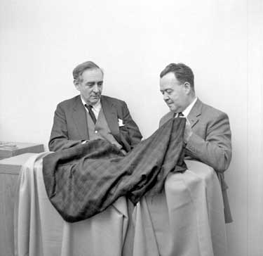 Mr Bell and Mr Mahoney with Fabric, Technical College Textile Department 	