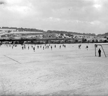 Football in snow at Leeds Road 	