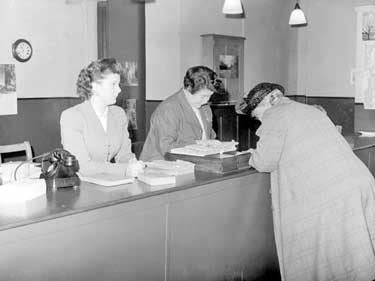 Two Women in Station Office 	