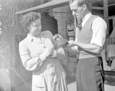 Mrs Meal and Inspector Lunning holding a squirrel, Marsden 	