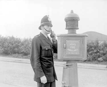 Policeman at Police Box, Fernside Estate, Almondbury 	