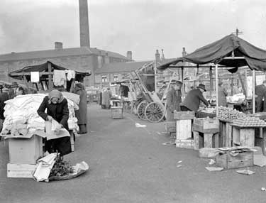 Huddersfield Open Market, Ray Street, behind the bus depot on Leeds Road. The market was relocated in the 1970s to the Victorian Market on Byram Street. 	