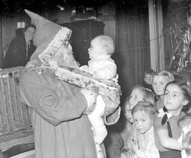 Father Christmas with children 	