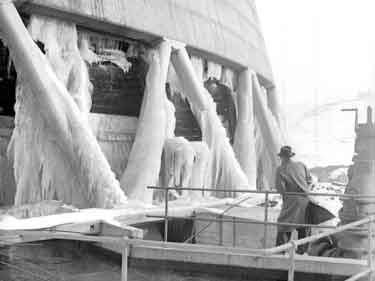 Ice formation on bottom of cooling tower 	