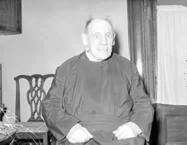 Reverend W M Griffiths, Vicar of Longwood, Huddersfield 	