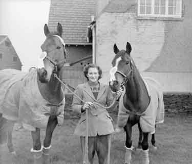 Pat Sutcliffe with two horses, Can Can and Tessa 	