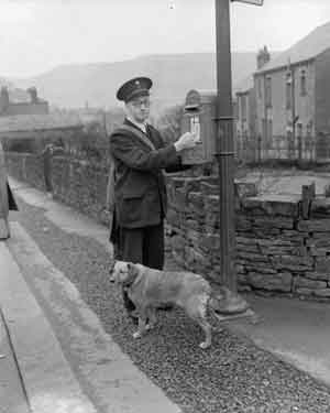 Marsden postman and his dog 	