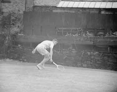 S Hoejberg playing tennis at Edgerton, Huddersfield 	