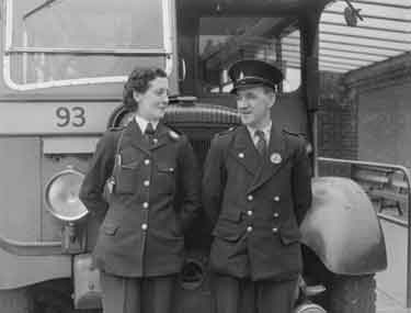 Bus driver and bus conductress 	