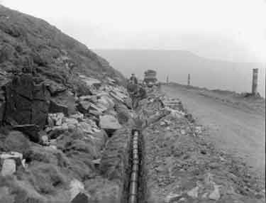 Holme Moss - laying pipes 	
